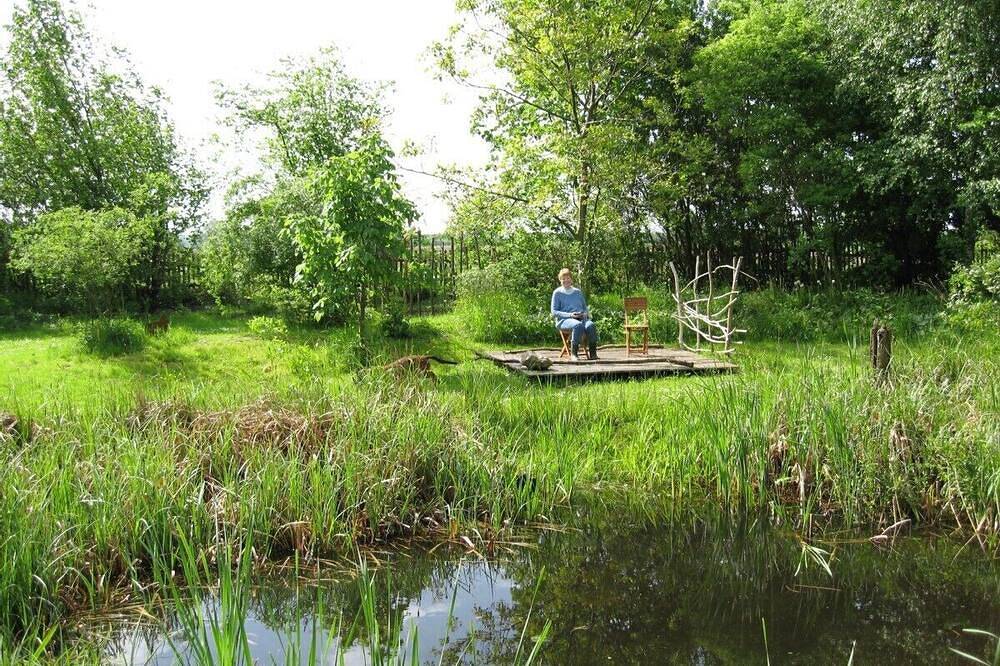 In een rustige locatie in een dorp op een betoverende tuin en bosgrond in Luckau (Wendland), Lüneburger Heide