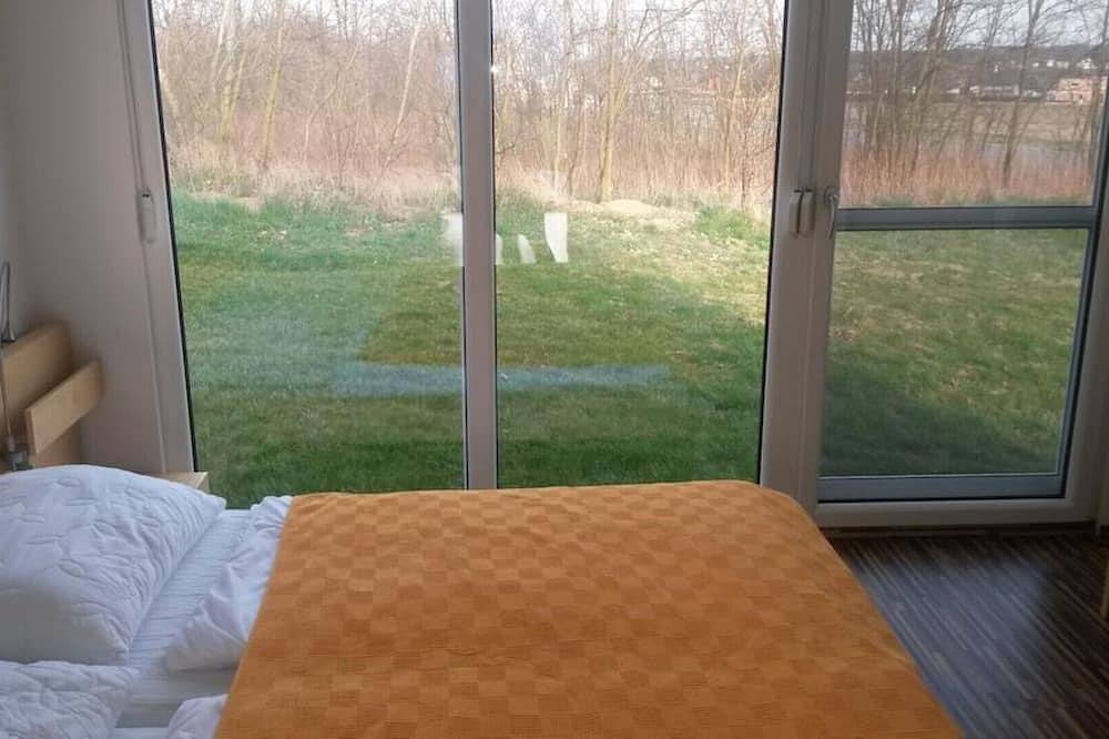 Mikrohaus Apartment  mit 1 Schlafzimmer und Gartenblick in Haslau-Maria Ellend, Bezirk Bruck an der Leitha