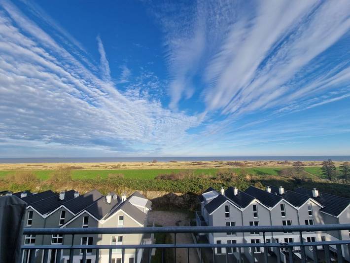 Ferienwohnung für 4 Personen, mit Balkon und Sauna sowie Ausblick in Schillig