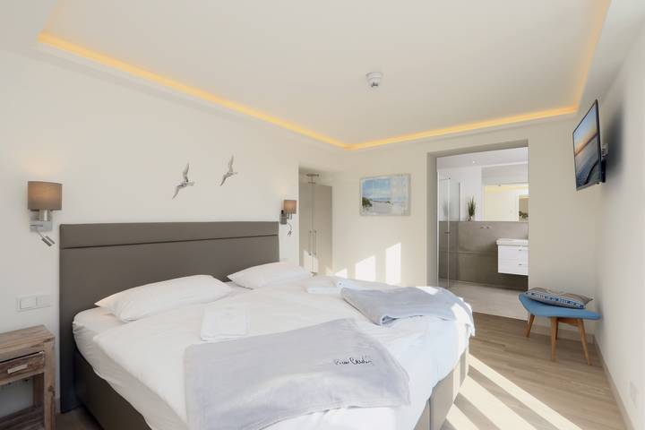 Ferienwohnung für 4 Personen, mit Garten und Kinderpool sowie Sauna in Binz