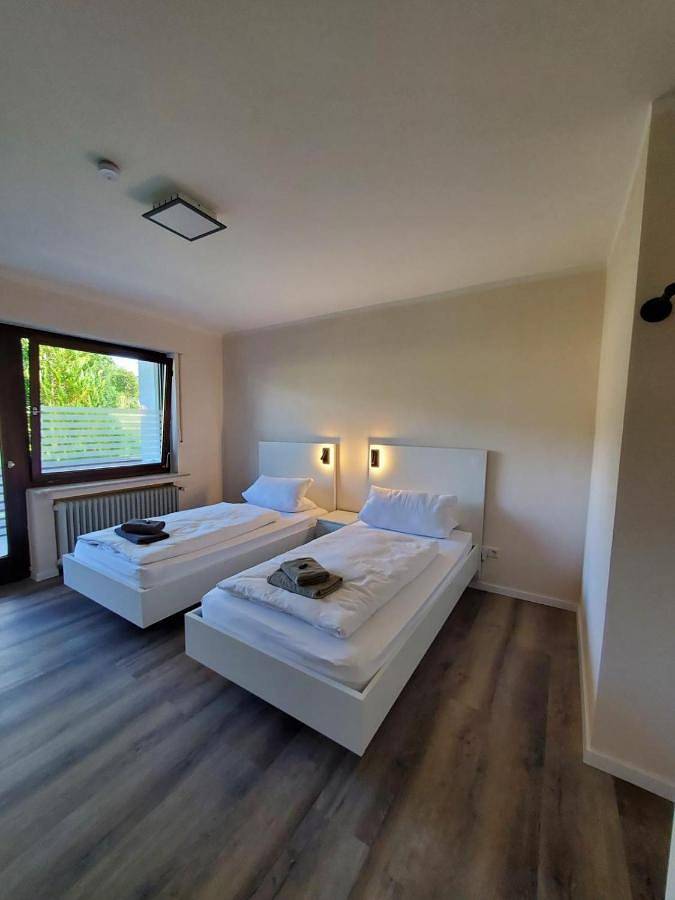 Ferienwohnung für 4 Personen, mit Balkon und Terrasse sowie Garten