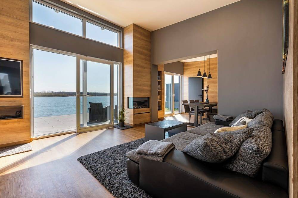 Traumhaus/Privatstrand 120m², Sauna,Klimaanlage,Terrasse,Garten,Grill,Boot in Löbnitz, Nordsachsen