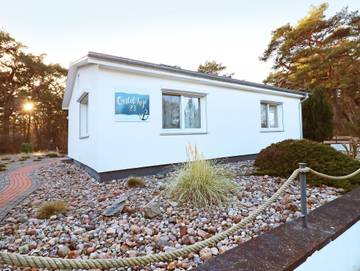 Ferienhaus mit Meerblick für 7 Personen, mit Sauna und Terrasse sowie Garten, kinderfreundlich in Trassenheide