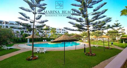 Cottage pour 3 personnes, avec bassin pour enfant et piscine ainsi que jardin et vue dans Marina Smir