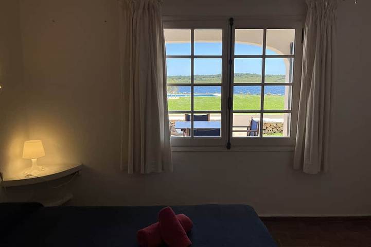 Entire apartment, Very front line stunning sea views near the beach in Fornells, Es Mercadal