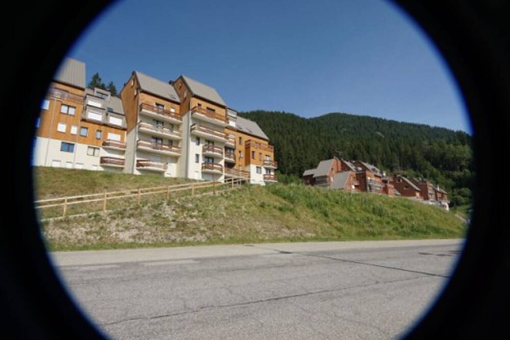 Apartamento entero, Apartamento de 2 habitaciones al pie de pistas con balcón y guardaesquís in La Ferrière, Le Pleynet