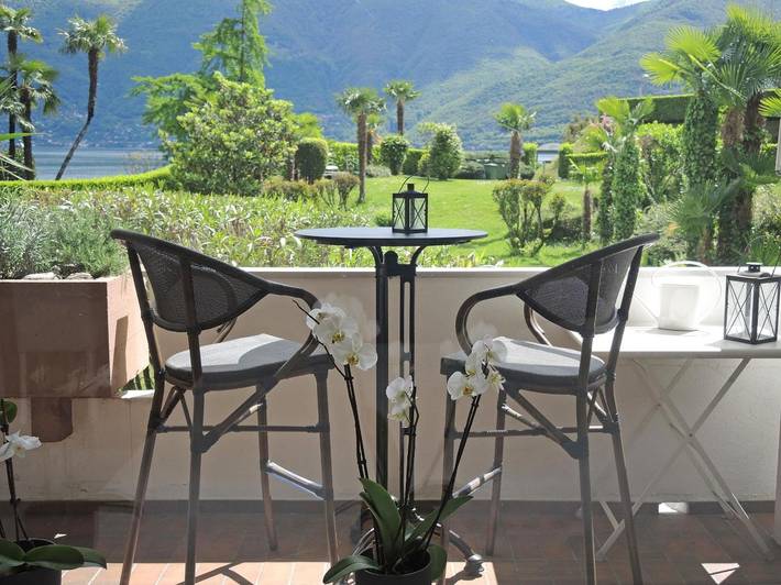 Ferienwohnung für 2 Personen, mit Balkon und Pool sowie Sauna und Seeblick in Brissago