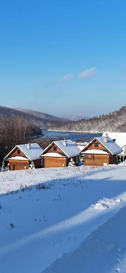 Domek letniskowy dla 8 osób, z ogród i widok na jezioro oraz widok i basen, zwierzęta dozwolone w Solina
