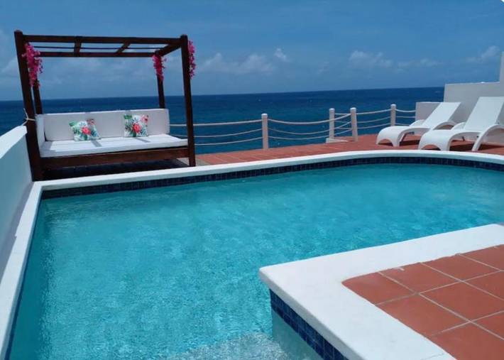 Vakantieappartement voor 4 personen, with balkon and zwembad as well as uitzicht op Sint Maarten