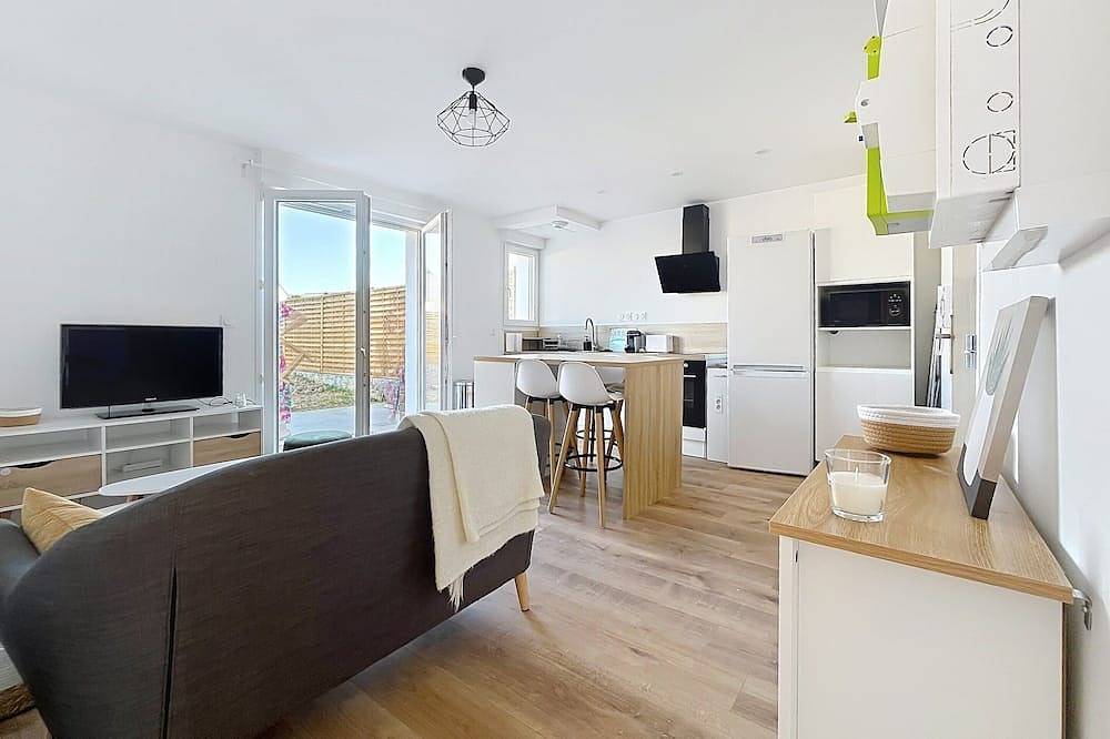 Ganze Wohnung, Bright apartment with a garden, perfect for the beaches and exploring Morbihan in Kervignac, Côte des Mégalithes