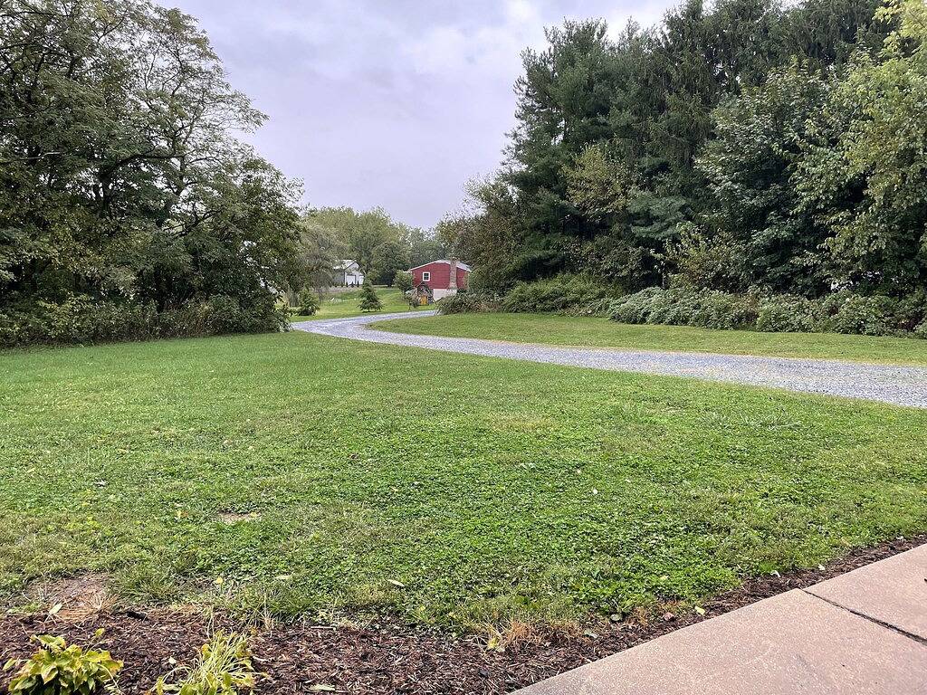 Remodeled country home in neighborhood with Amish farms, fire pit in back yard in Lebanon County