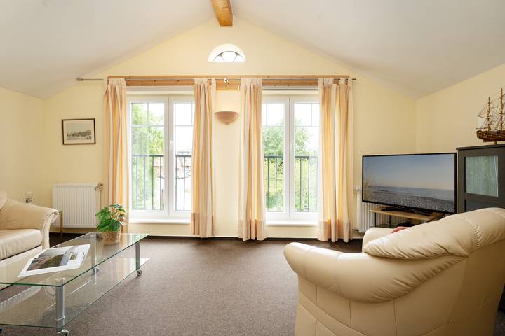 Ferienwohnung für 2 Personen, mit Terrasse und Garten, kinderfreundlich in Lemkenhafen