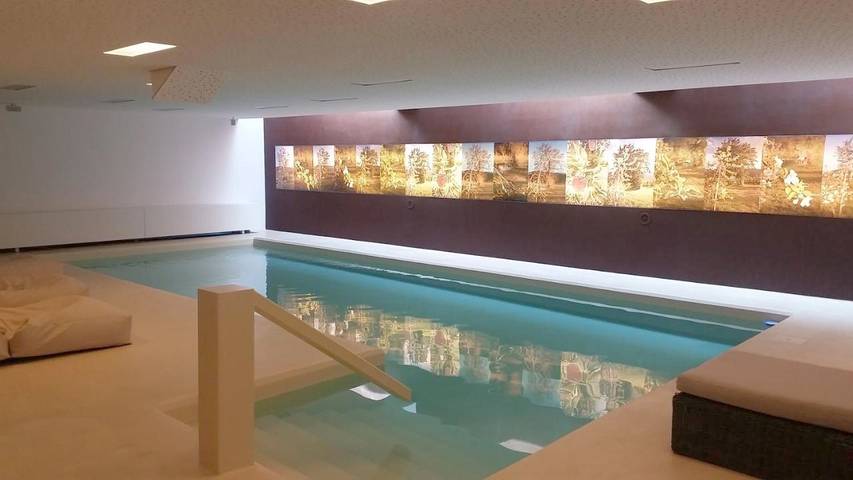 Ferienwohnung für 3 Personen, mit Balkon und Garten sowie Pool und Sauna in Latsch