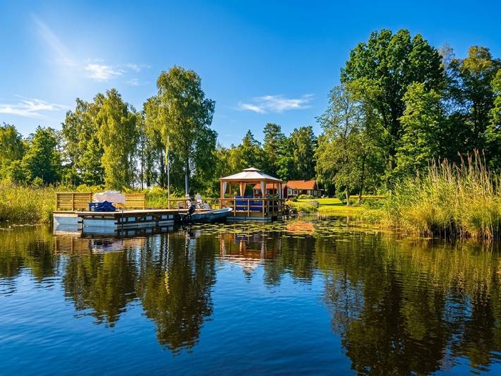 Ferienhaus direkt am See Åsnen (Achtung: Kein Strom und fliessend Wasser) in Åsnen