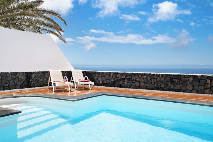 Apartamento entero, Apartamento "La Vega de Lanzarote 4" con vistas al mar, piscina y Wi-Fi in Tías, Lanzarote