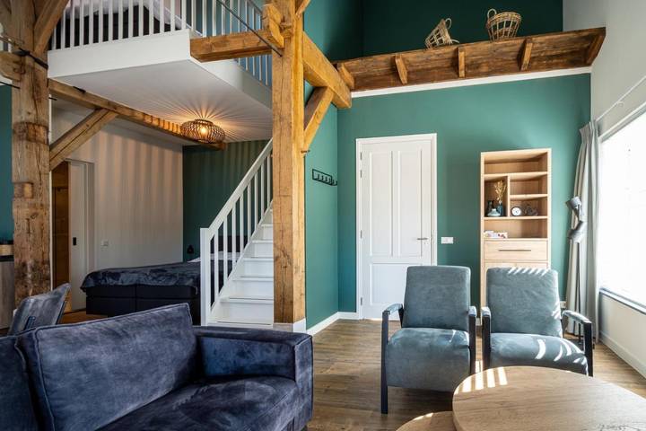 Chambre d’amis pour 7 personnes, avec terrasse ainsi que vue et jardin dans Wijhe