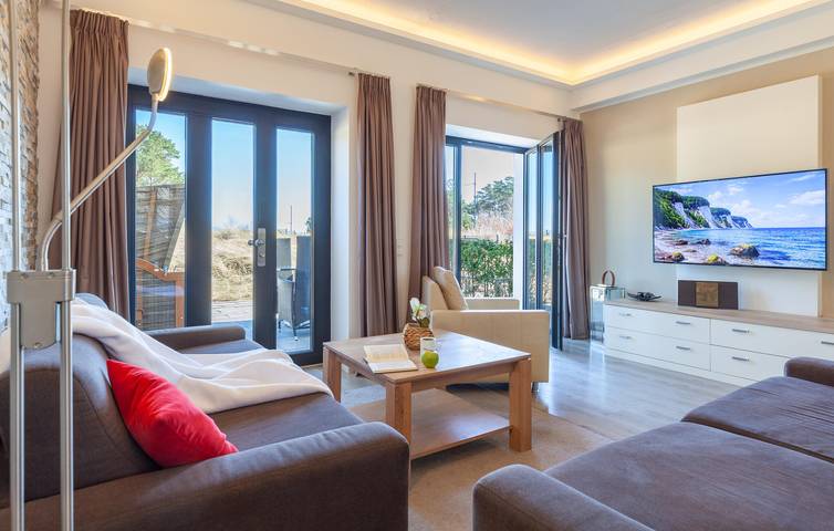 Geheel vakantieappartement, Bliss aan het strand - Modern appartement met terras & TV (500m van Strand Binz) in Strand Prora, Binz