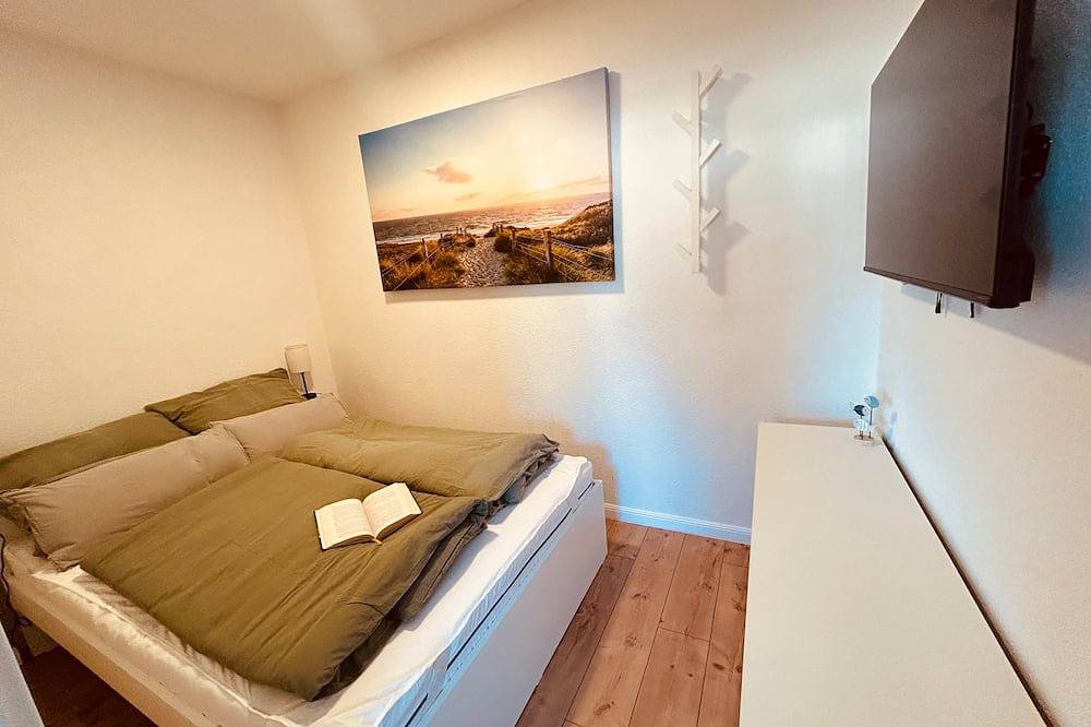 Vier Nordlichter – Eg-Wohnung mit Garten in Bensersiel, Esens
