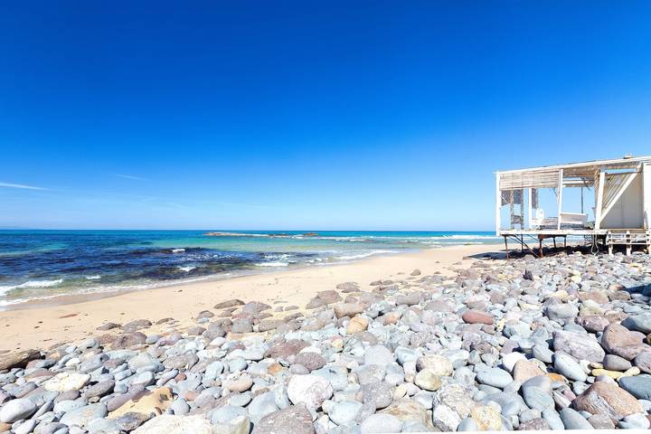 Casa vacanza per 6 persone, con Giardino a Lu Bagnu