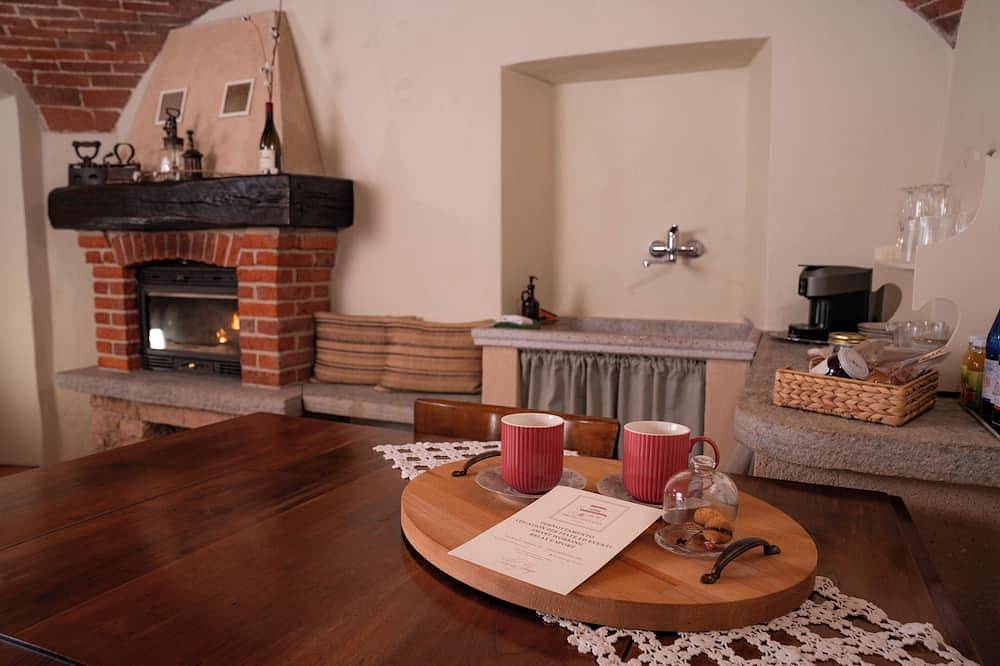 Bruno Selvago's Casba.  Rustic house with exposed brick surrounded by vineyards. in Lessona, Provincie Biella