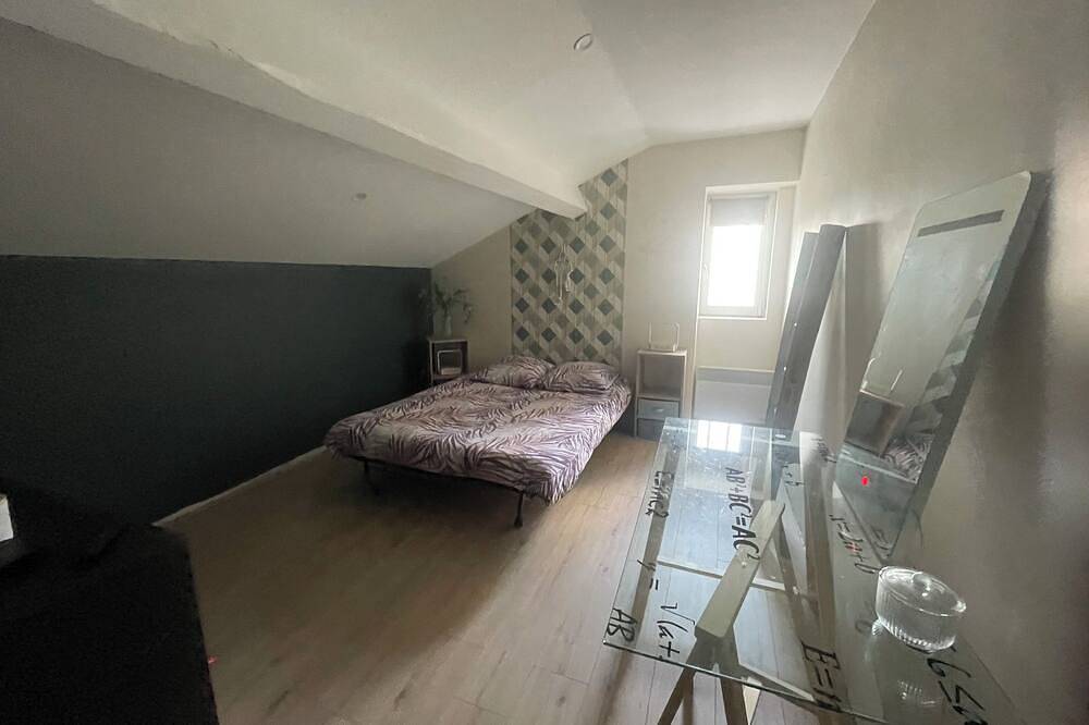 Sleek bedroom in Solaize, Rhône