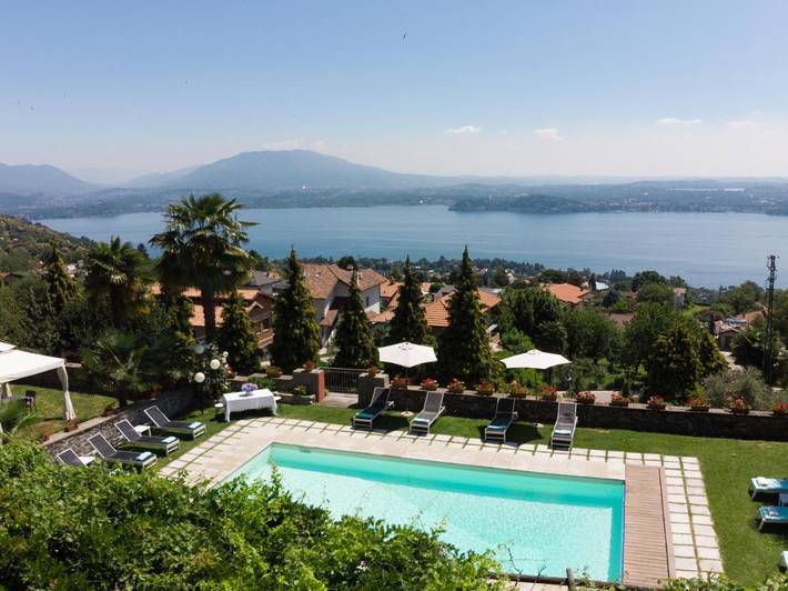 Maison de campagne pour 2 personnes, avec Balcon et Terrasse ainsi que Jardin et Piscine dans Massino Visconti