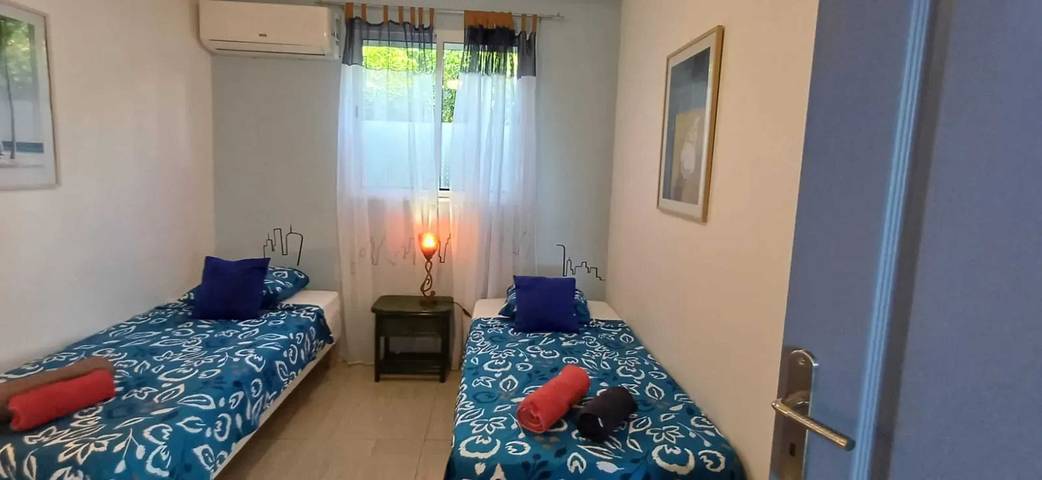 Location de vacances pour 4 personnes, avec piscine et terrasse dans Plage de Petite Anse - 4