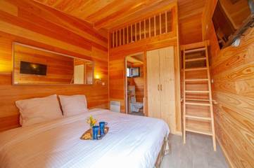 Hôtel pour 4 personnes, avec bassin pour enfant et vue ainsi que piscine et jardin à Martres-Tolosane