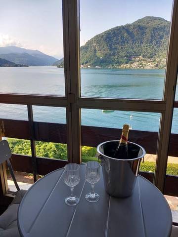 Ferienwohnung für 2 Personen, mit Seeblick und Ausblick sowie Garten in Luganer See (Lombardei)