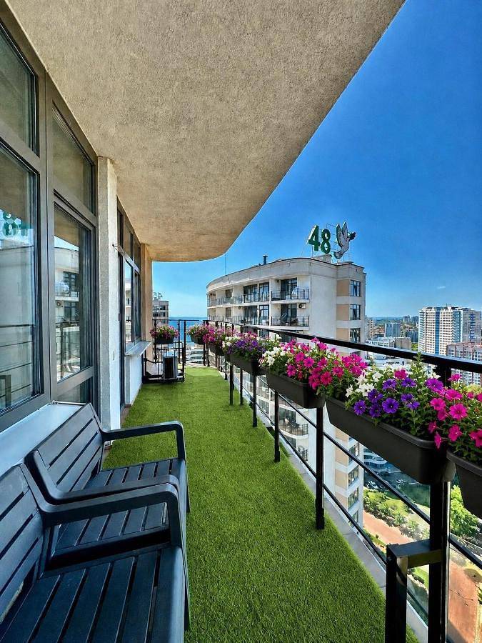 Appartement de vacances pour 4 personnes, avec Balcon et Terrasse ainsi que Jardin et Vue