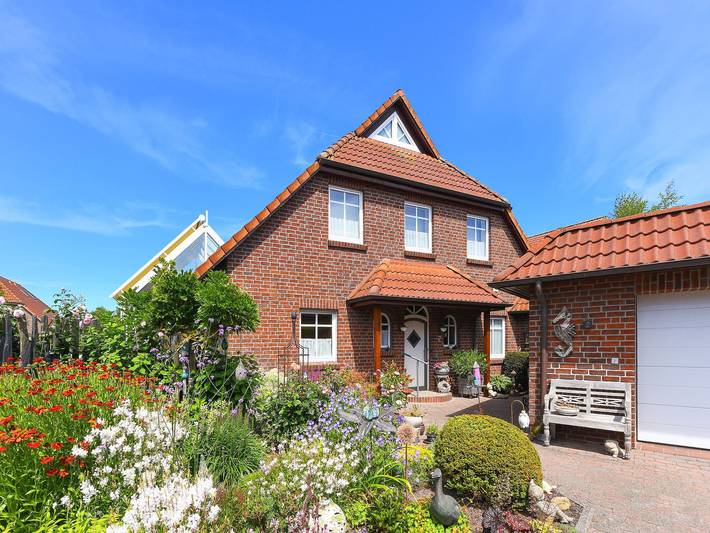 Ferienwohnung für 4 Personen, mit Sauna und Terrasse sowie Garten in Neuharlingersiel