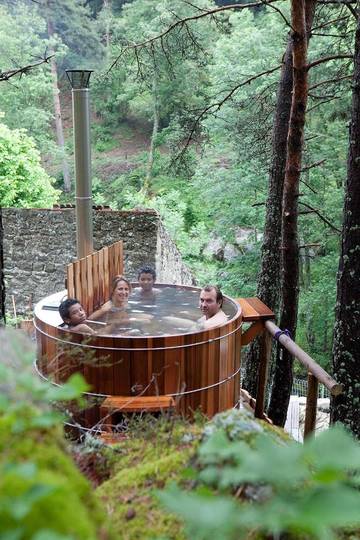 Cottage pour 2 personnes, avec jacuzzi et sauna ainsi que terrasse et jardin à Lapte