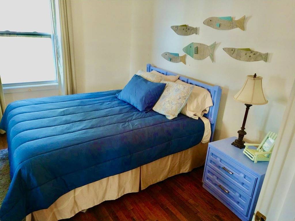 New Listing! Lake front cottage with 100' of private sandy beach in Prudenville, Roscommon County