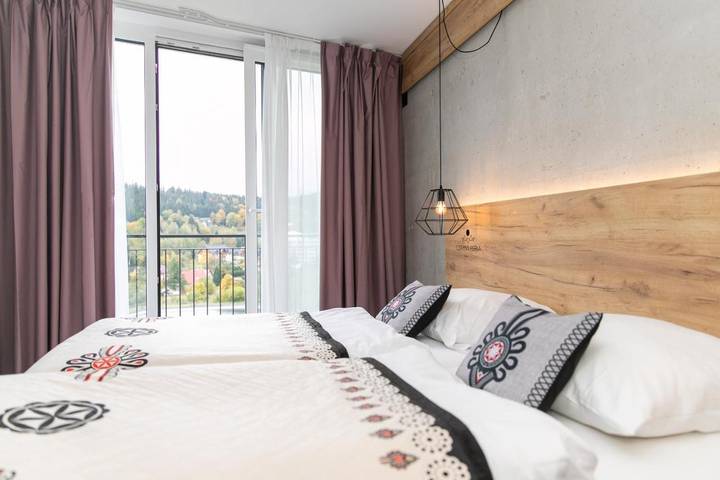 Ferienwohnung für 4 Personen, mit Garten und Sauna sowie Whirlpool und Pool in Sienna