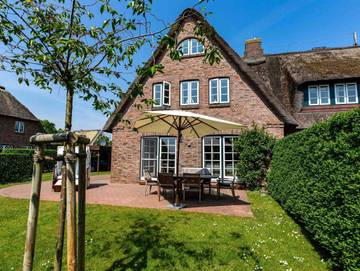 Ferienhaus für 6 Personen, mit Terrasse und Sauna sowie Garten in Utersum