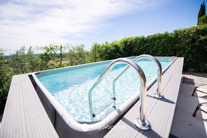 Ferienhaus für 8 Personen, mit Balkon und Garten sowie Pool und Ausblick