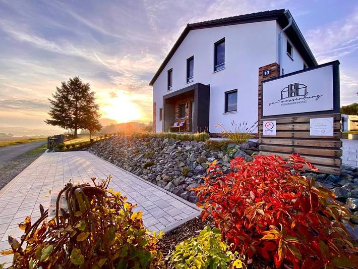 Ferienwohnung für 4 Personen, mit Terrasse und Garten sowie Seeblick und Ausblick in Oelsnitz