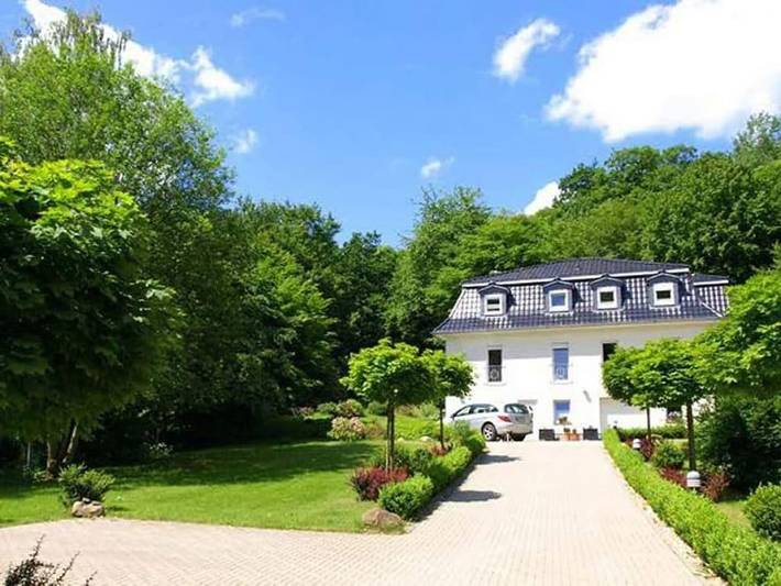 Ferienhaus für 4 Personen, mit Balkon und Garten