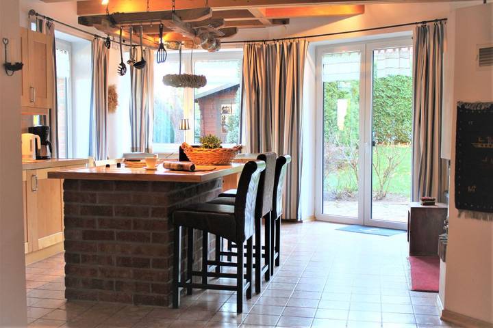 Ferienwohnung für 5 Personen, mit Balkon und Terrasse sowie Garten und Sauna