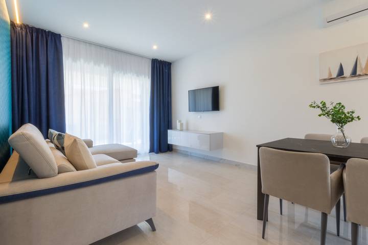 Entire apartment, Apartment "Residence Meridian Unità 4" Near the Beach with Mountain View, Pool, A/C, Wi-Fi & Balcony in Villa San Pietro, Cagliari Province