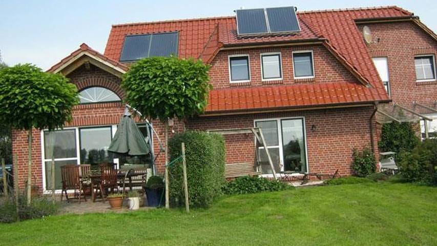 Ferienwohnung für 3 Personen, mit Terrasse, kinderfreundlich in Rysum