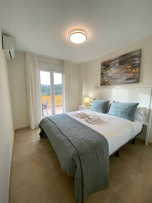 Apartamento de férias para 4 pessoas, com terraço e piscina e ainda jardim and vista, com animais de estimação em El Faro