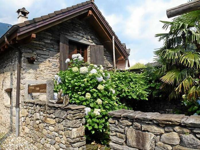 Ferienhaus für 4 Personen, mit Balkon und Garten