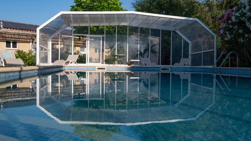 Appartement de vacances pour 4 personnes, avec Terrasse et Jardin ainsi que Piscine et Vue