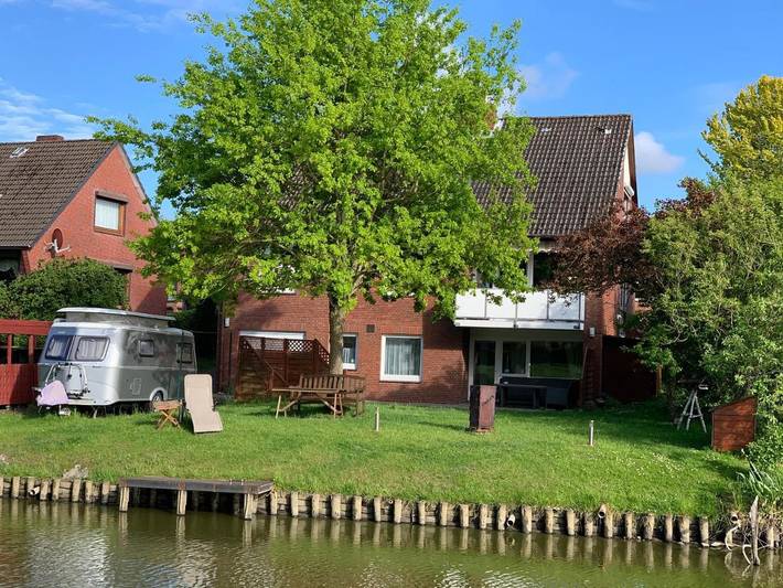 Ferienwohnung für 3 Personen, mit Terrasse und Garten sowie Ausblick in Glückstadt