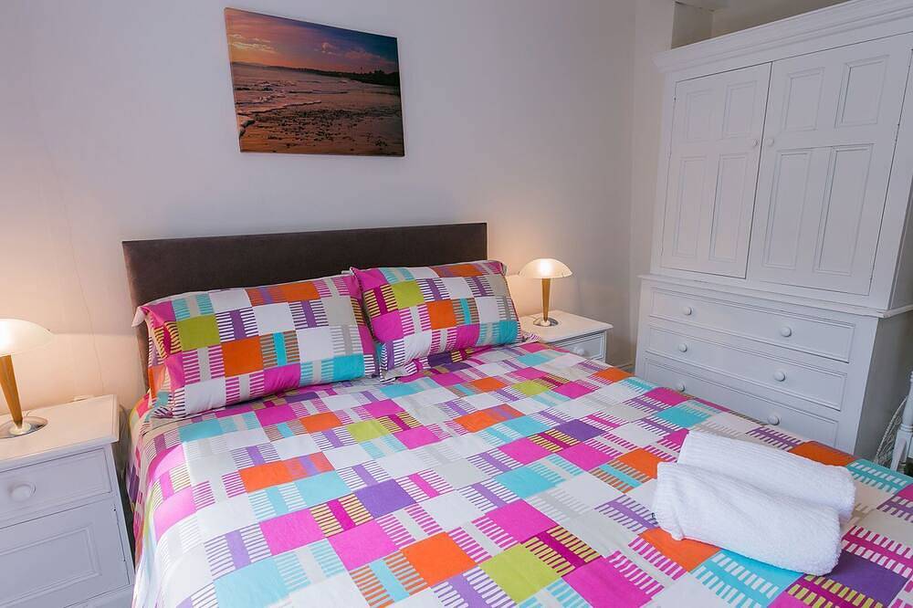 Entire apartment, Ty'r Ardd -  a ground floor bedroom that sleeps 7 guests  in 4 bedrooms in Red Wharf Bay, Isle of Anglesey