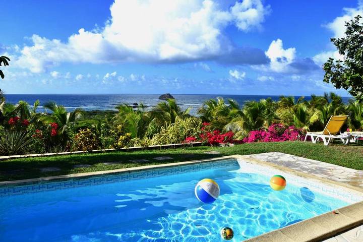 Cottage pour 6 personnes, avec jardin ainsi que piscine et vue dans Anse A La Gourde Saint Francois