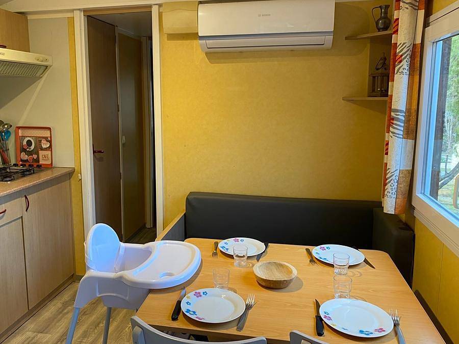 Camping les Pialades - Mobilheim 4 personen - Holz-Mobilheim Baby mit Klima - 26m² mit überdachter Terrasse / 2 Zimmer in Nabirat, Périgord Noir