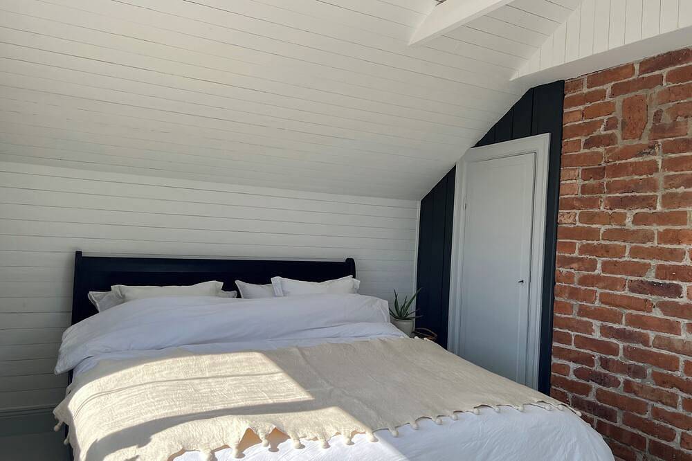 Semi-detached house near the sea, Gotland ferry and archipelago boats in Nynäshamn