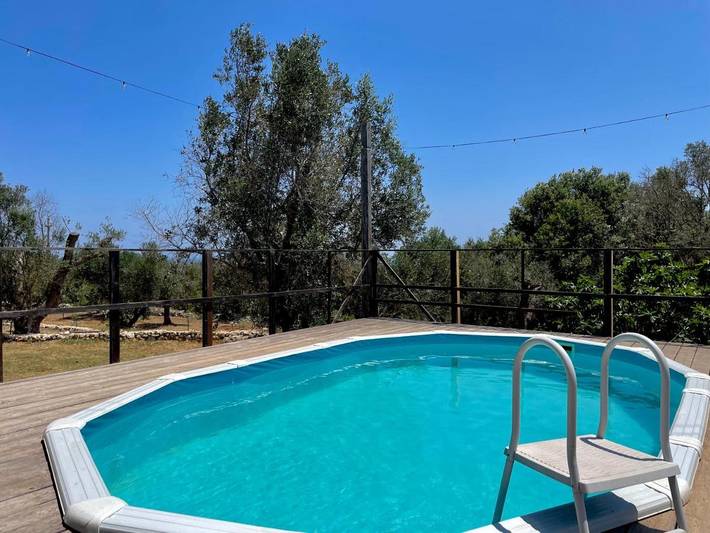 Appartamento per 4 persone, con piscina e panorama nonché piscina per bambini e giardino, con animali domestici in Andrano